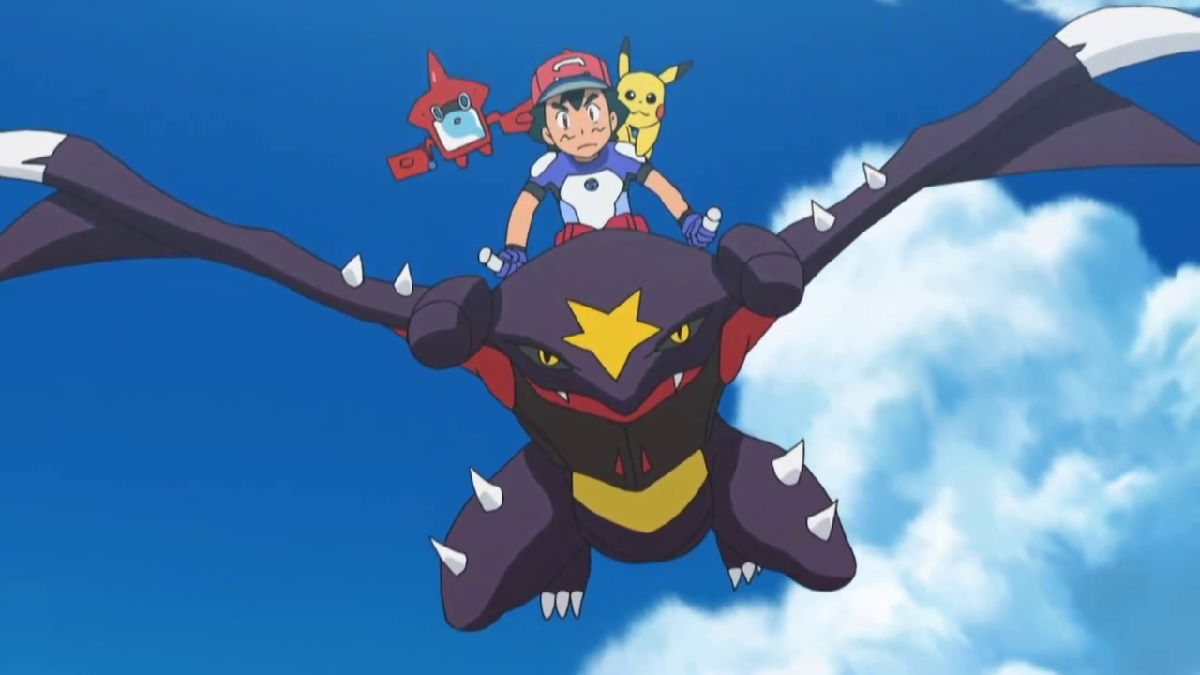 Ash Ketchum montado en un Garchomp