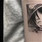 Tatuaje de One Piece: Luffy sonriente