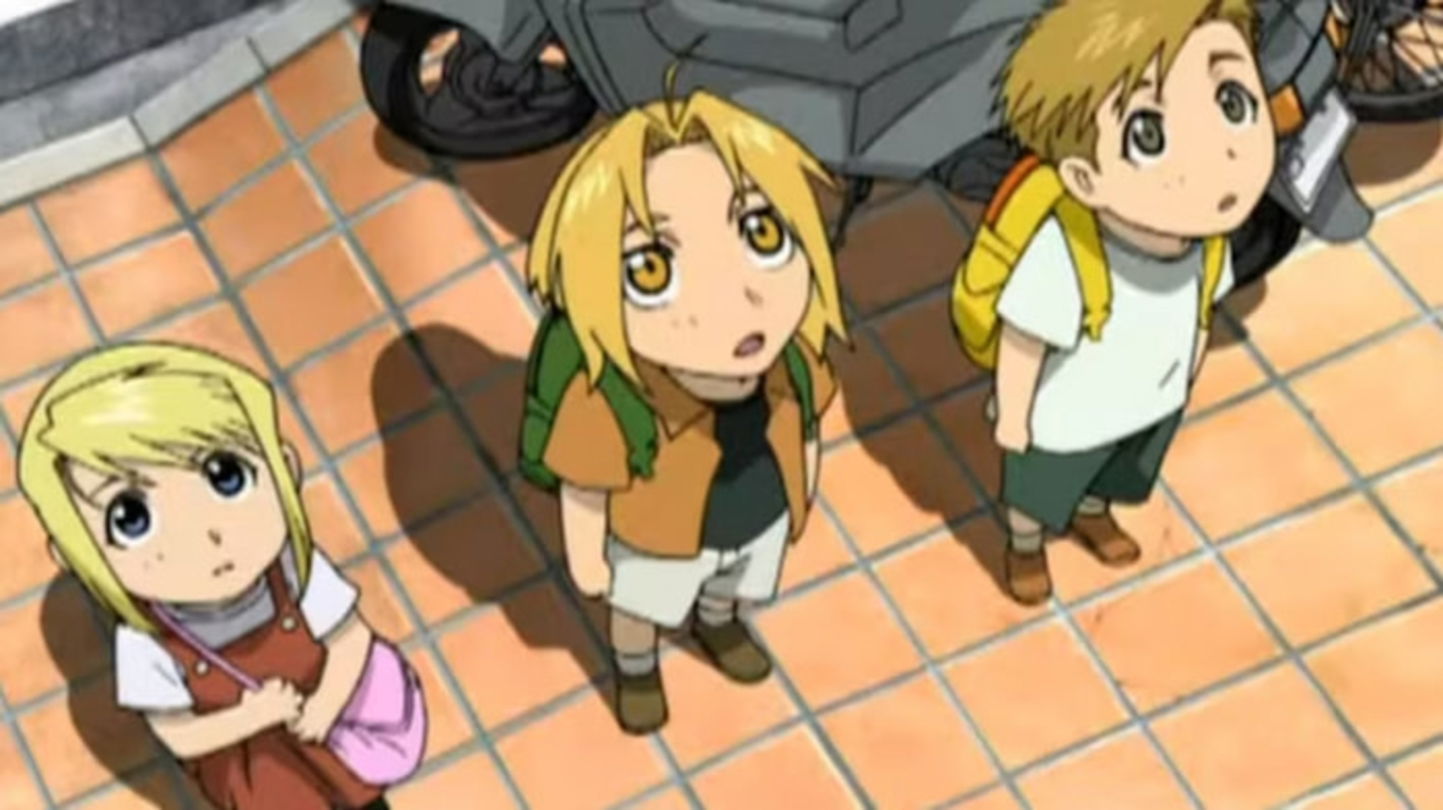 La OVA nos muestra a tres niños parecidos a Edward, Al y Winry