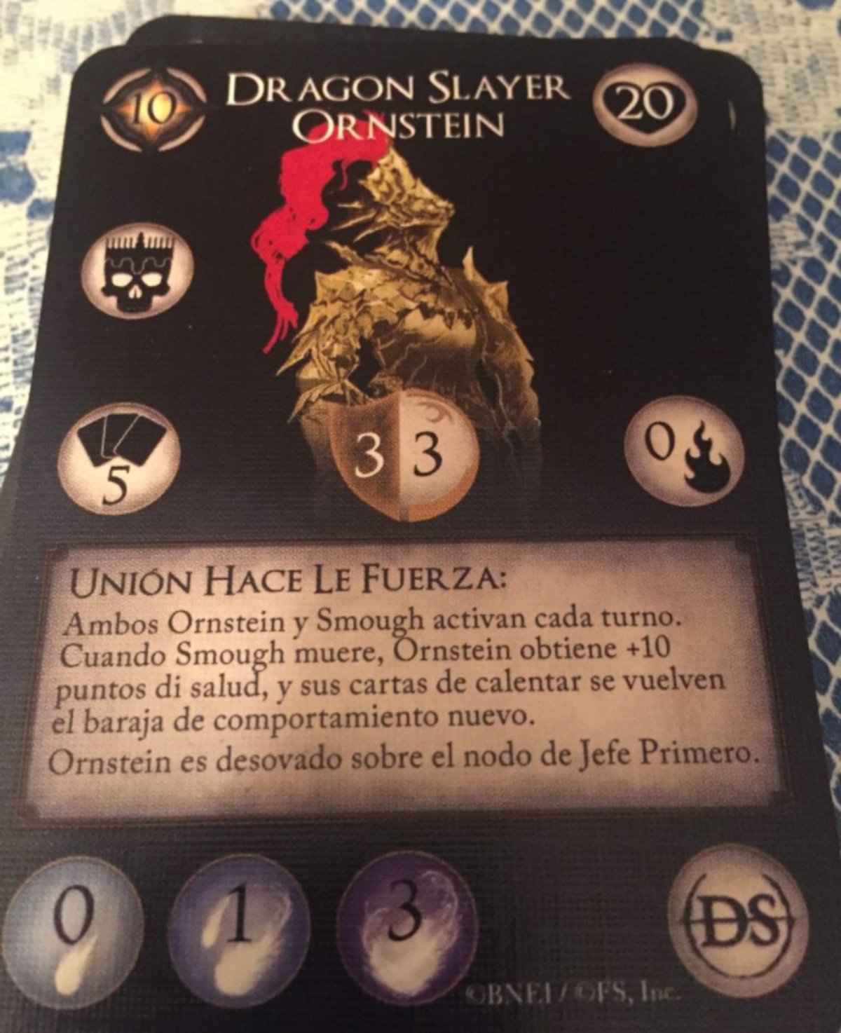 Dark Souls: Su juego de mesa genera polémica por un error de traducción en la carta de Ornstein